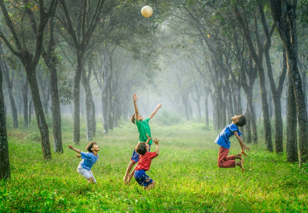 Children playing in the forest